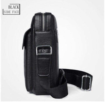 Black leather laptop bag side view with adjustable shoulder strap and zipper closure