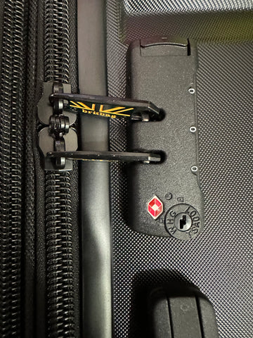 Briggs & Riley travel luggage zipper and lock detail, durable fabric with secure closure