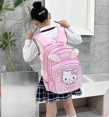 Pink Hello Kitty school backpack with 3D ears, worn by girl in uniform, ideal for students and travel