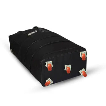 Large black wheeled duffle bag with five red swivel wheels on white background