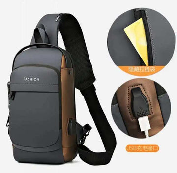 Grey and brown crossbody sling bag with USB charging port and hidden zipper pocket