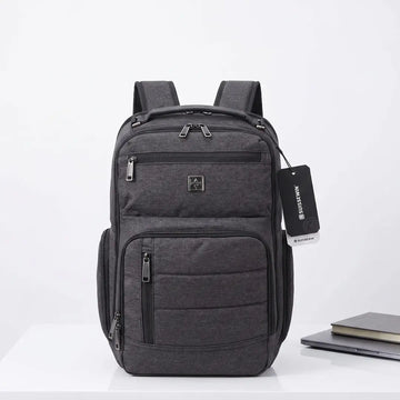 Grey Suissewin laptop backpack with multiple zippers, ideal for students and travel, shown with notebook and laptop.