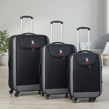 Black Polo luggage set with red logo, ideal for travel, featuring three sizes with spinner wheels.
