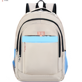 Beige student backpack with blue accents, front pocket, and pink zipper pull for school or travel