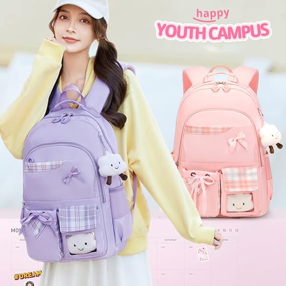 Purple and pink student backpacks with cute plush charms, perfect for campus travel and school use.