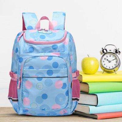 Blue polka dot student backpack with pink accents, ideal for school, books, and daily use
