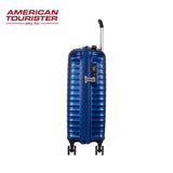 Blue American Tourister hardshell suitcase with 4 wheels and extendable handle for travel