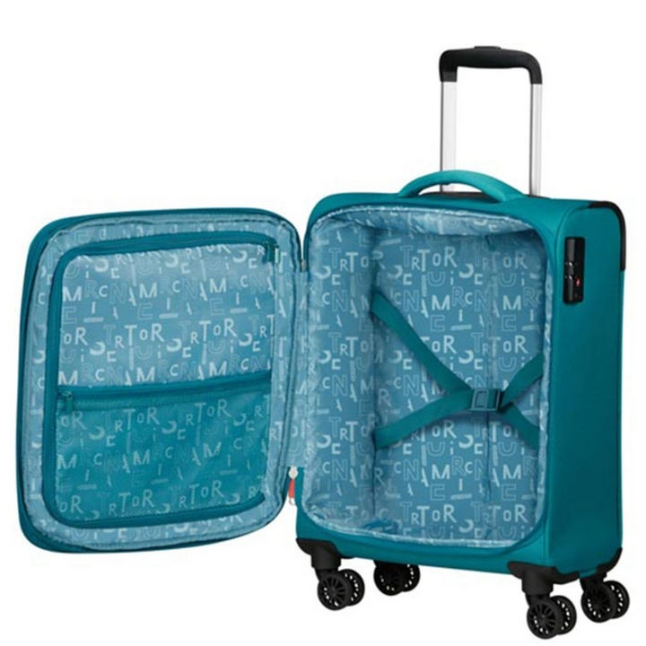 Teal hardshell carry-on luggage with patterned interior, 4 wheels, and extendable handle for travel