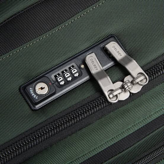 Green travel luggage with TSA-approved combination lock and zipper pull, secure for trips