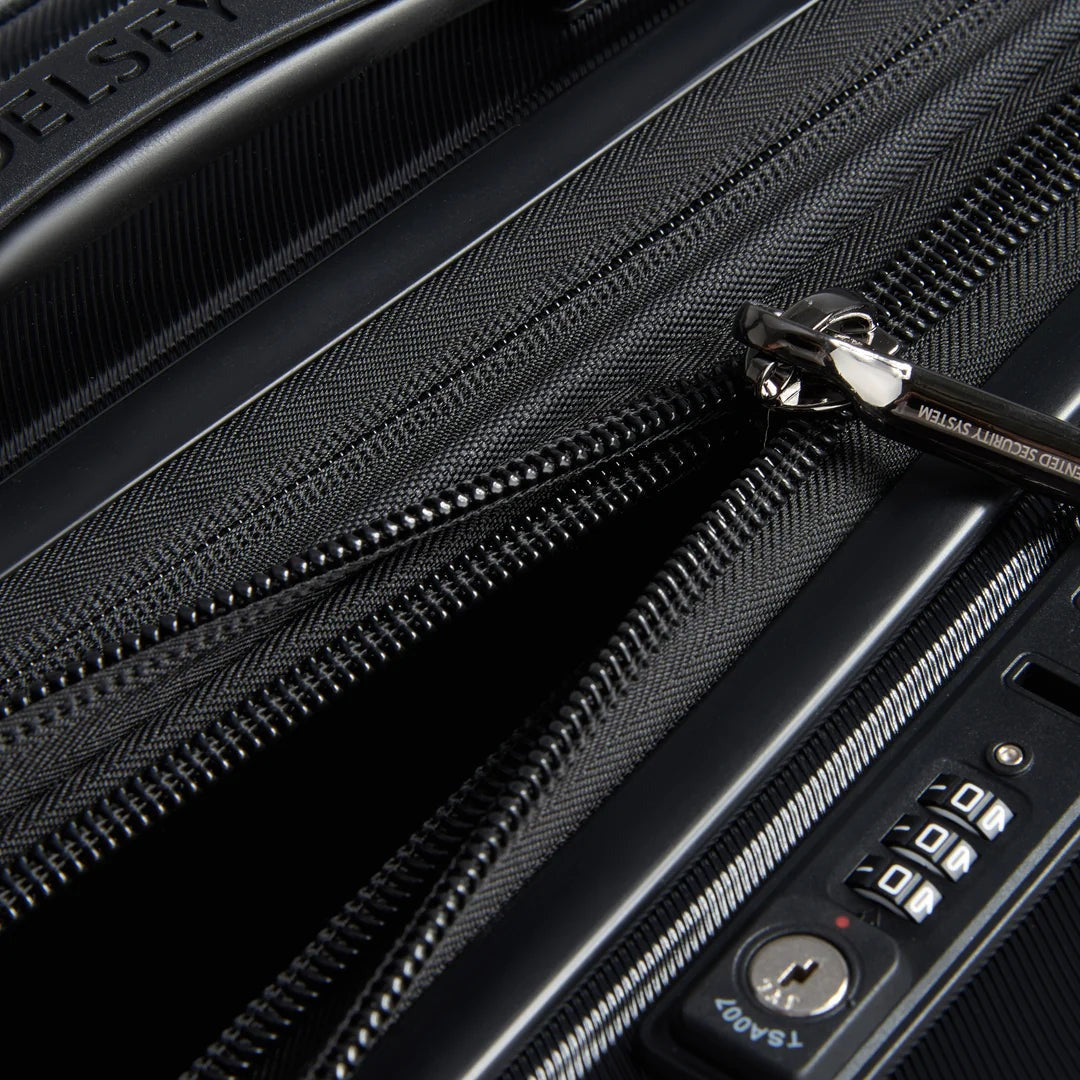 Black travel luggage with TSA lock and zipper detail for secure packing