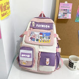Cute pink and purple student backpack with cartoon bunny patches, ideal for school or travel
