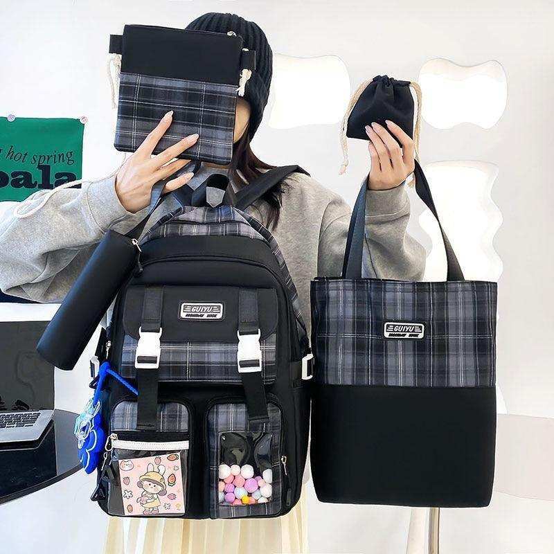 Plaid backpack, tote bag, and matching pouches set for school or travel