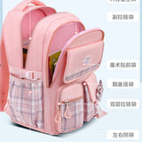 Pink student backpack with plaid pockets, magic tape front pocket, and dual-zip compartments for school supplies