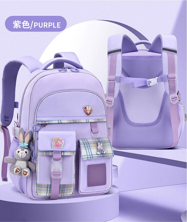 Purple kids school backpack with bunny charms, plaid pockets, and cat-ear straps for students