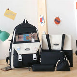 Stylish black and white student backpack with matching tote, pencil case, and drawstring pouch, perfect for school or travel.