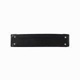 Black leather luggage base with metal studs and white stitching on white background