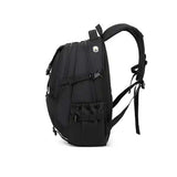 Black laptop backpack with multiple zip compartments, side pockets, and adjustable straps