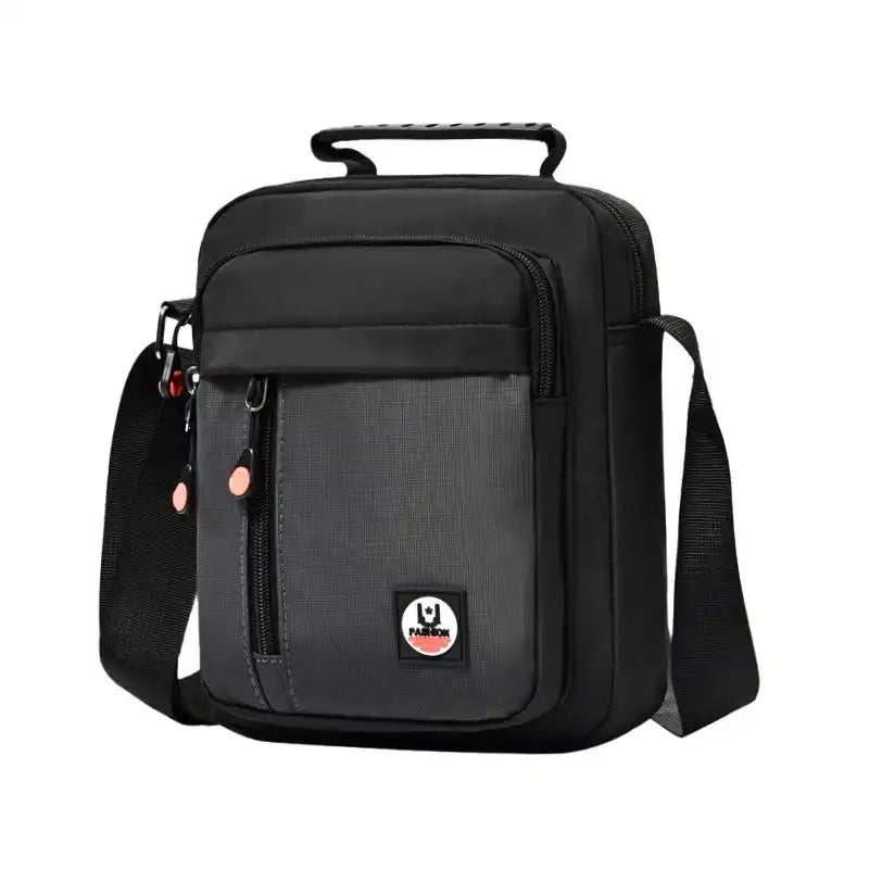 Black crossbody bag with adjustable strap, front pocket, and top handle for travel or daily use