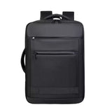 A black laptop backpack with a front zippered pocket and top carry handle, shown from the back view on a solid white background.
