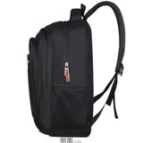 Black school or laptop backpack side view with mesh pocket and multiple zippered compartments