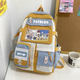 Cute yellow and blue student backpack with cartoon patches, ideal for school or travel