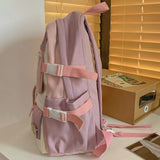 Pink and cream student backpack with adjustable straps, ideal for school or travel