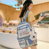 Blue fashion student backpack with cute cartoon patches and clear front pocket, perfect for school or travel