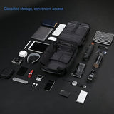Black travel backpack with organized compartments for laptop, tablet, phone, and accessories