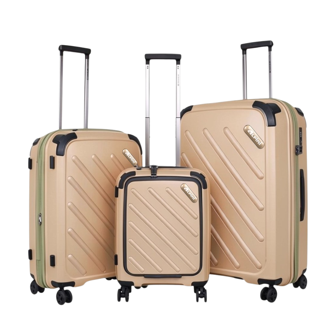 Beige hardshell luggage set with diagonal ridges, extendable handles, and spinner wheels for travel