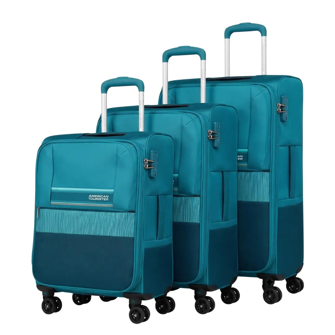 Three-piece American Tourister spinner luggage set in teal blue, featuring a softside carry-on, a medium suitcase, and a hardside suitcase, shown on a white background.