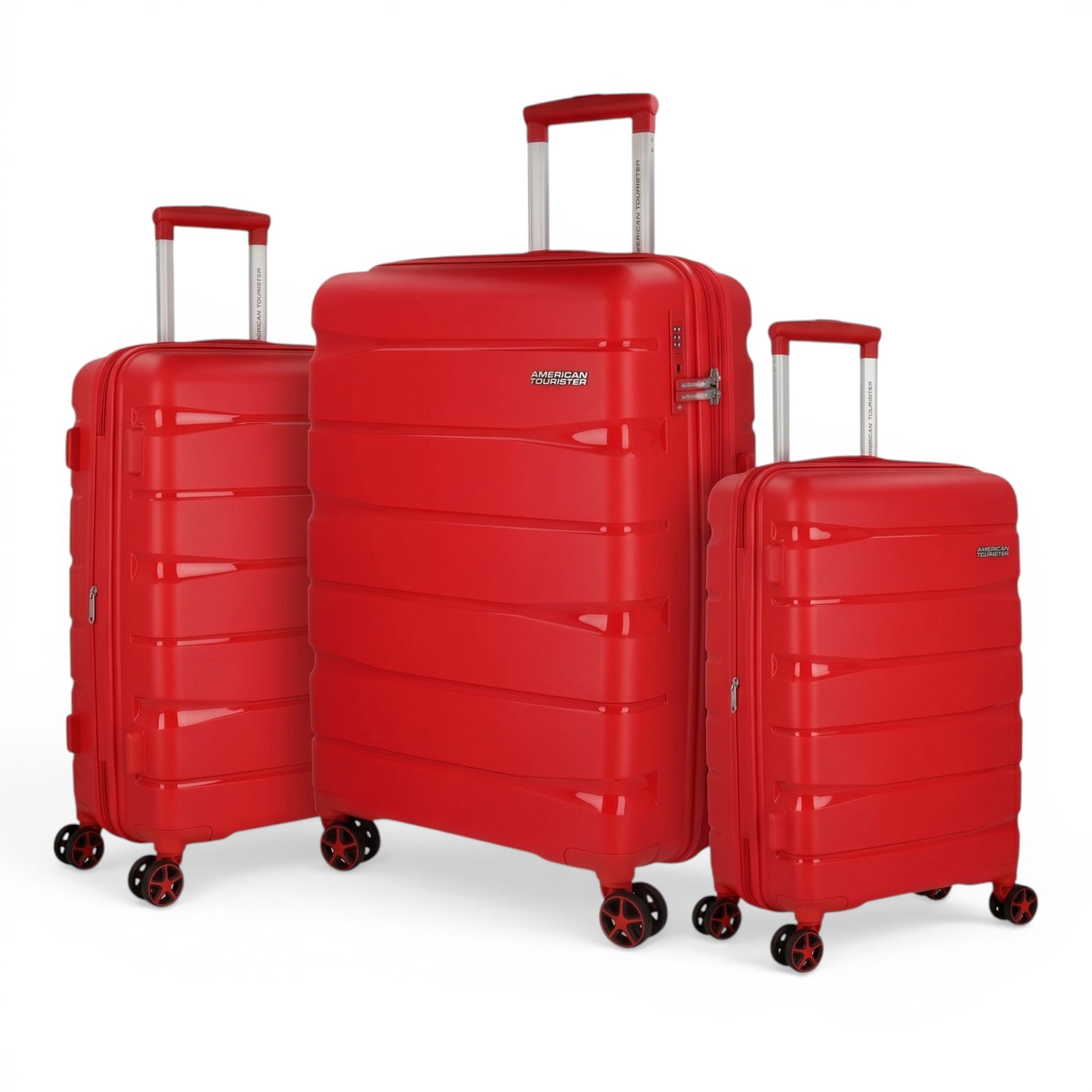 Red American Tourister hardshell luggage set with spinner wheels, ideal for travel and trips