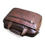 Brown leather laptop briefcase with zippered compartments and top handle for business travel