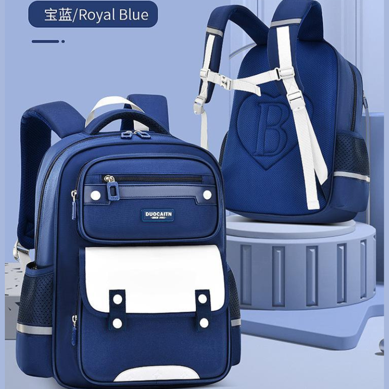 Royal blue student backpack with white accents, ergonomic straps, and front pocket for school or travel use