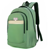 Green student backpack with black straps and front pocket, ideal for school or travel