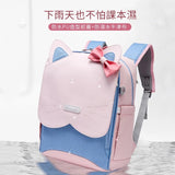 Pink and blue cat-ear student backpack with waterproof PU front flap and bow detail