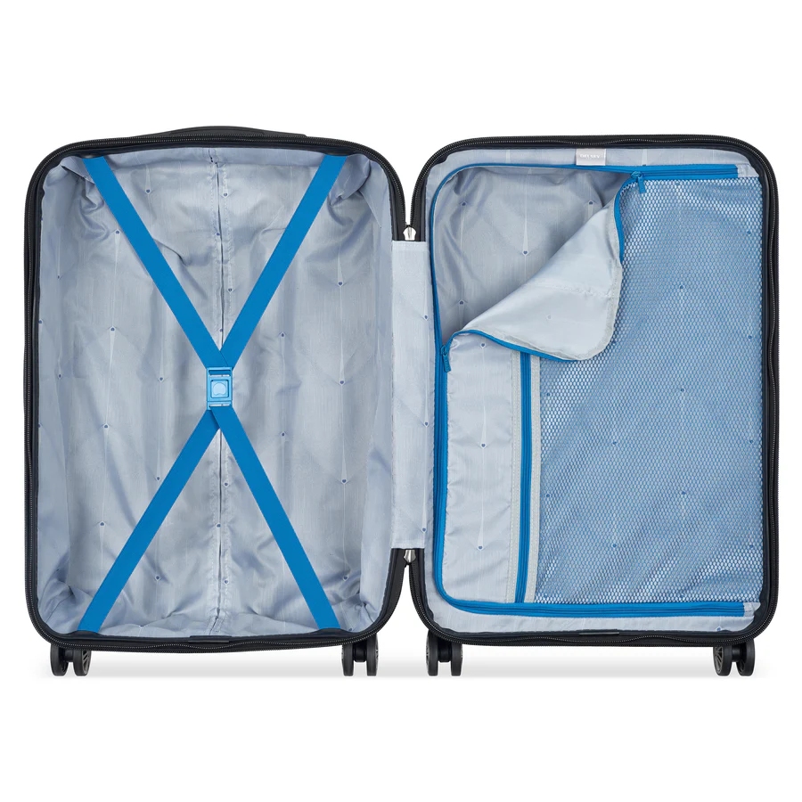 Open hardshell suitcase with blue X-straps and mesh pocket, ideal for travel luggage storage