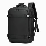 Black travel backpack with multiple straps and buckles, ideal for students and laptop carry