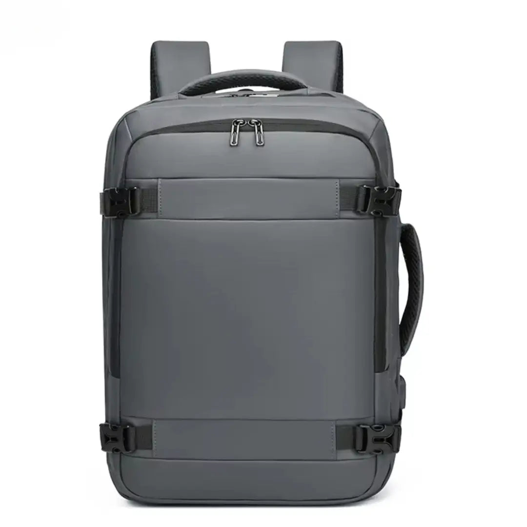 Grey travel backpack with side straps and top handle for laptop and student use