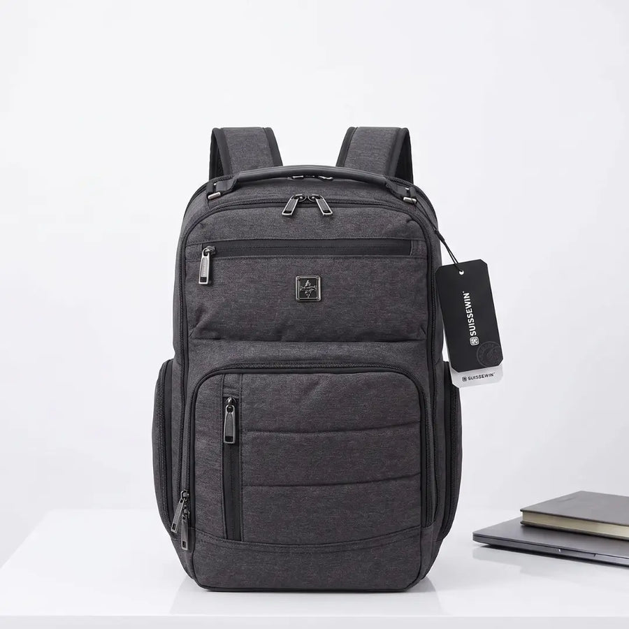 Grey Suissewin laptop backpack with multiple zippers, ideal for students and travel, shown with notebook and laptop.