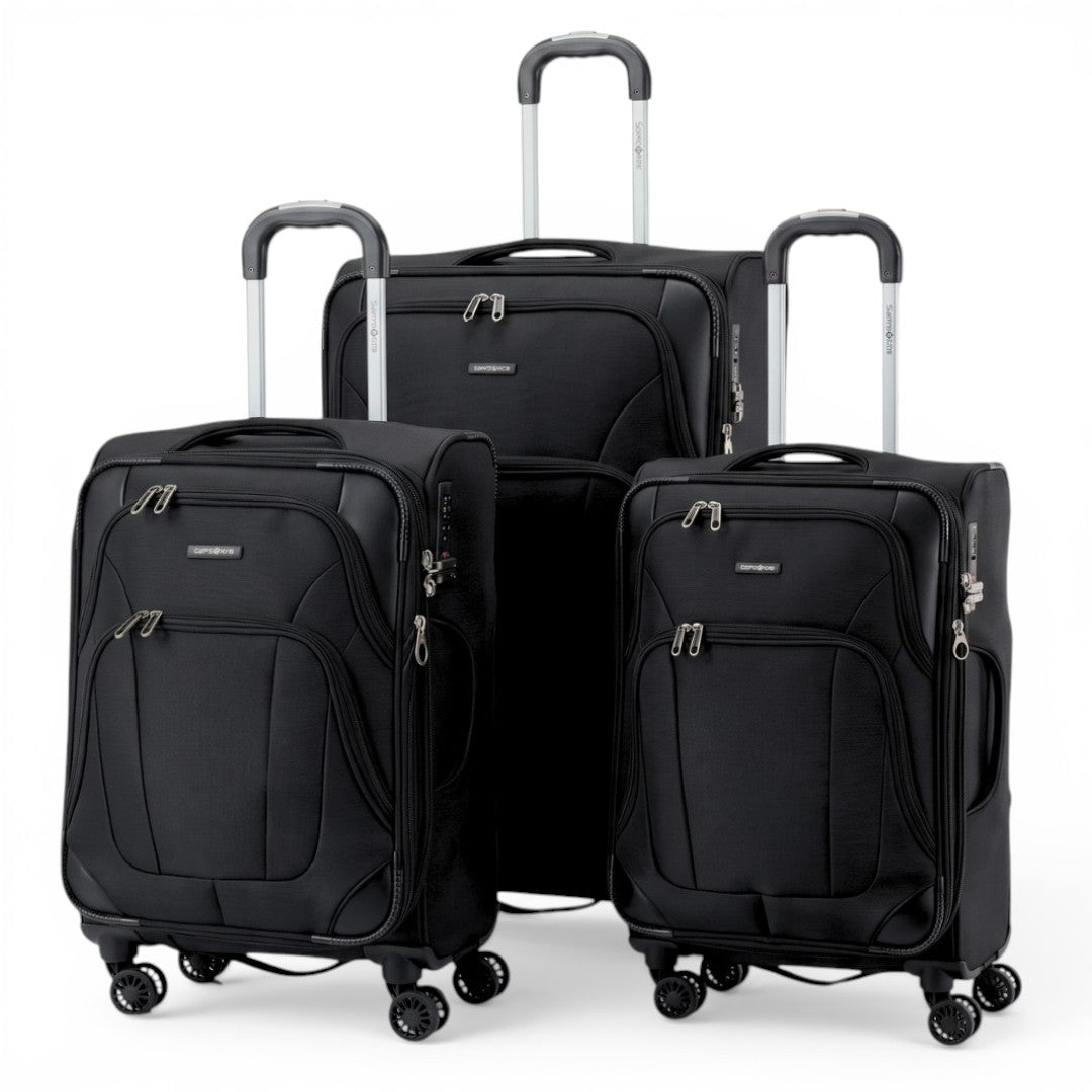 Black softside spinner luggage set with extendable handles and multiple zippers for travel
