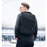 Man wearing black Samsonite laptop backpack for travel and daily use, ideal for students and professionals