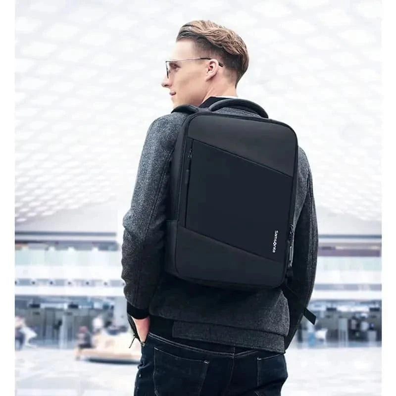 Man wearing black Samsonite laptop backpack for travel and daily use, ideal for students and professionals