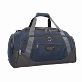 Blue and gray SwissTech duffel bag with multiple zippers and handles, ideal for travel or gym use.