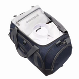 SWISSTECH duffel bag with packed white shirt, ideal for travel or gym use