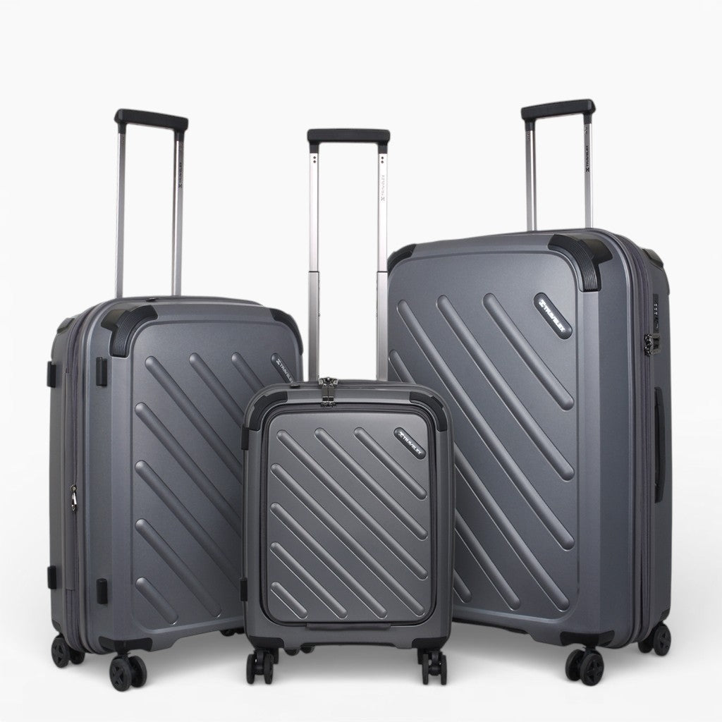 Grey hardshell travel luggage set with spinner wheels and extendable handles for easy mobility